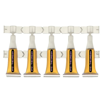 Strip of five 2112 - The Dream single-serve ampules filled with amber liquid, joined on a plastic sheet.