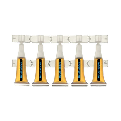 Row of five amber Blue Moon liquid ampules with twist-off tips, connected on a plastic strip.