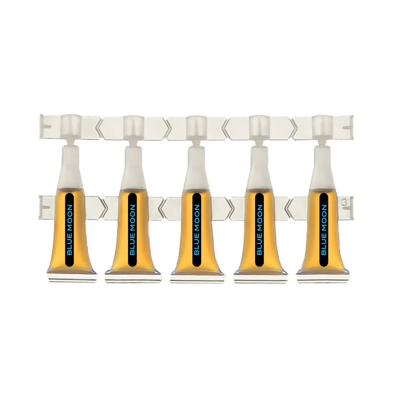 Row of five amber Blue Moon liquid ampules with twist-off tips, connected on a plastic strip.