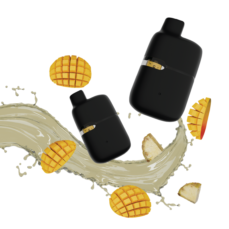 Two black all-in-one vape devices surrounded by cubed mango, sliced mango, ginger pieces, and a tan liquid splash graphic