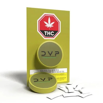 Two round olive-green DYP tins stacked with a dosage card behind them and loose white pouches scattered in front.