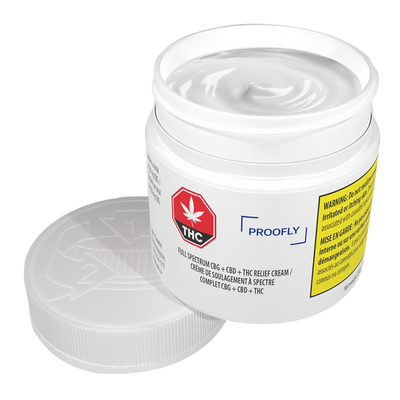 Open white jar of Proofly Full Spectrum CBG+CBD+THC Relief Cream with the lid removed, showing the cream texture inside and THC symbol on the label.