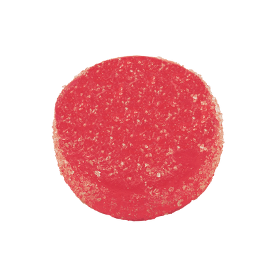 Close-up of a single round, sugar-dusted red Homestead Resin Gummy in cherry flavor.