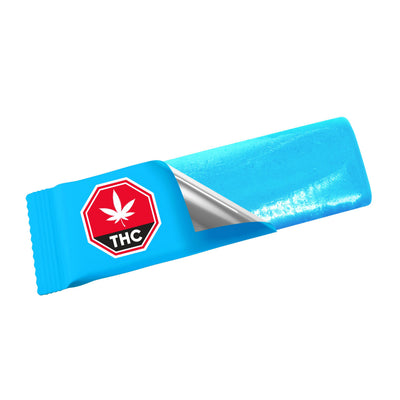 An individually wrapped blue chew for Blue Razz 30:10 CBG/THC, partially unwrapped to show the candy inside.