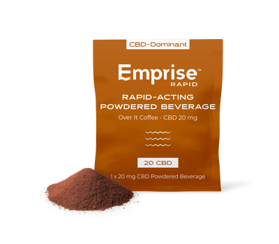 Copper-colored Emprise Rapid pouch for Over It Coffee CBD 20mg beside a pile of brown powdered beverage mix
