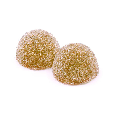 Two peach-colored, sugar-coated dome-shaped gummies leaning against each other.