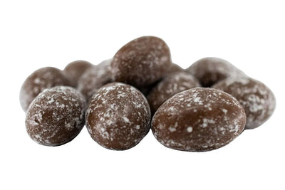A pile of chocolate-coated almonds dusted with cocoa powder.