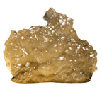 Close-up of a translucent amber slab of Liquid Imagination live resin concentrate with a glossy, bubbled surface texture.