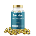Amber glass jar of Emprise Canada CBD-Dominant softgels labeled 6,000 mg CBD (60 x 100 mg), surrounded by loose gold softgel capsules.
