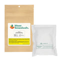 Kraft paper package for Blunt Botanicals Alaskan TF Zero Waste CBD Bath Bomb beside its white dissolvable inner pouch.