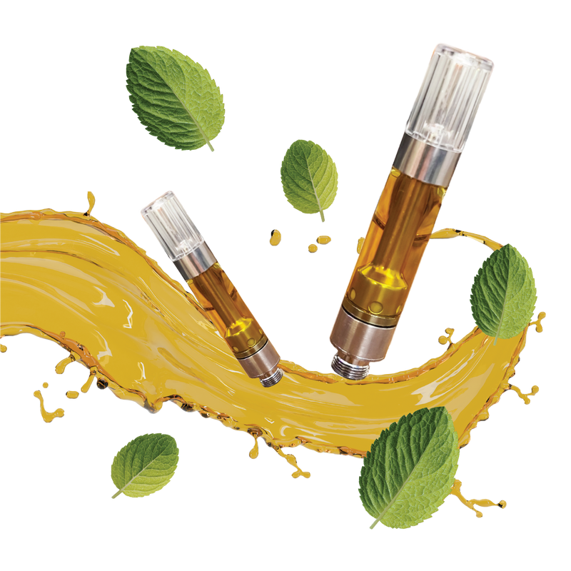 Two vape cartridges filled with amber oil surrounded by mint leaves and a golden liquid splash graphic