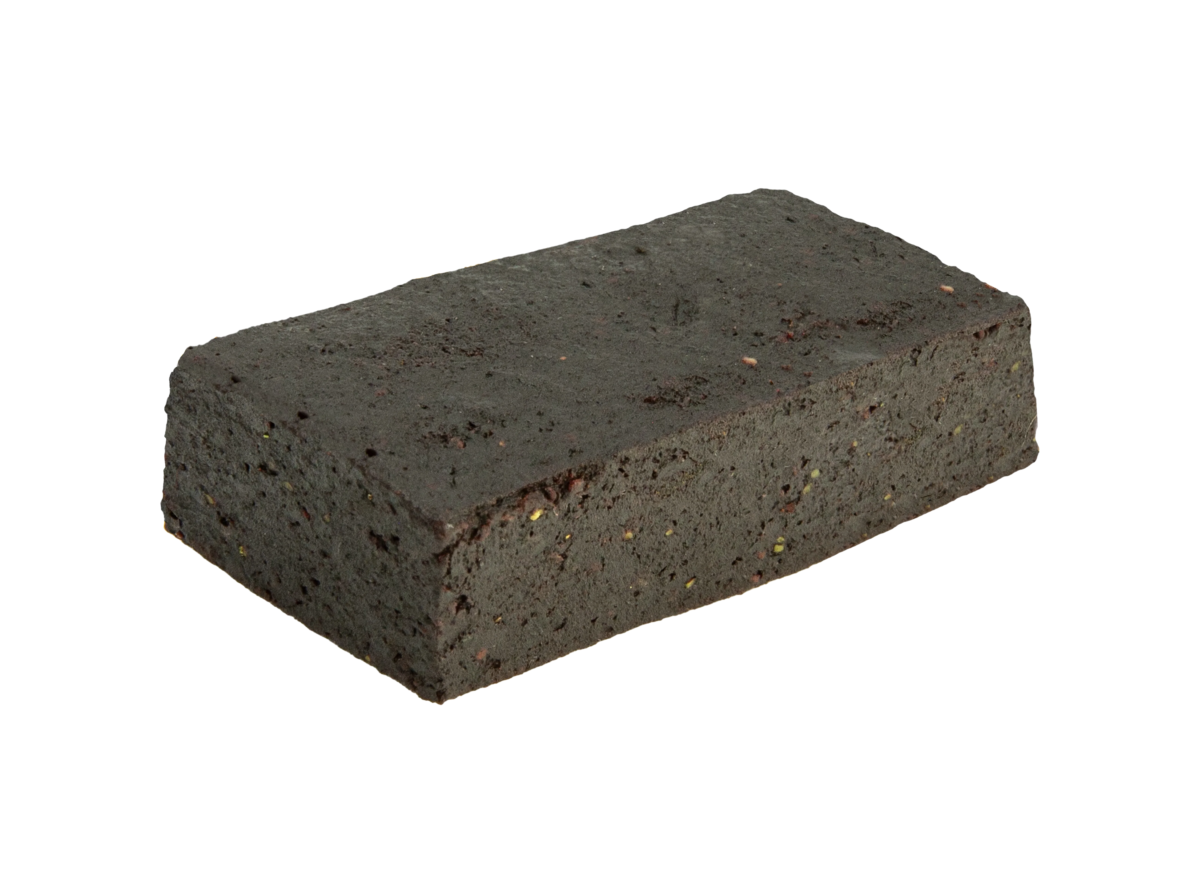 Close-up of a dark rectangular Blueberry Lavender CBN Fruit Bites bar with visible flecks of fruit and herb pieces.