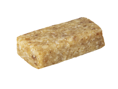 Single rectangular bar with visible coconut and grain pieces, shown at an angle on a white background.