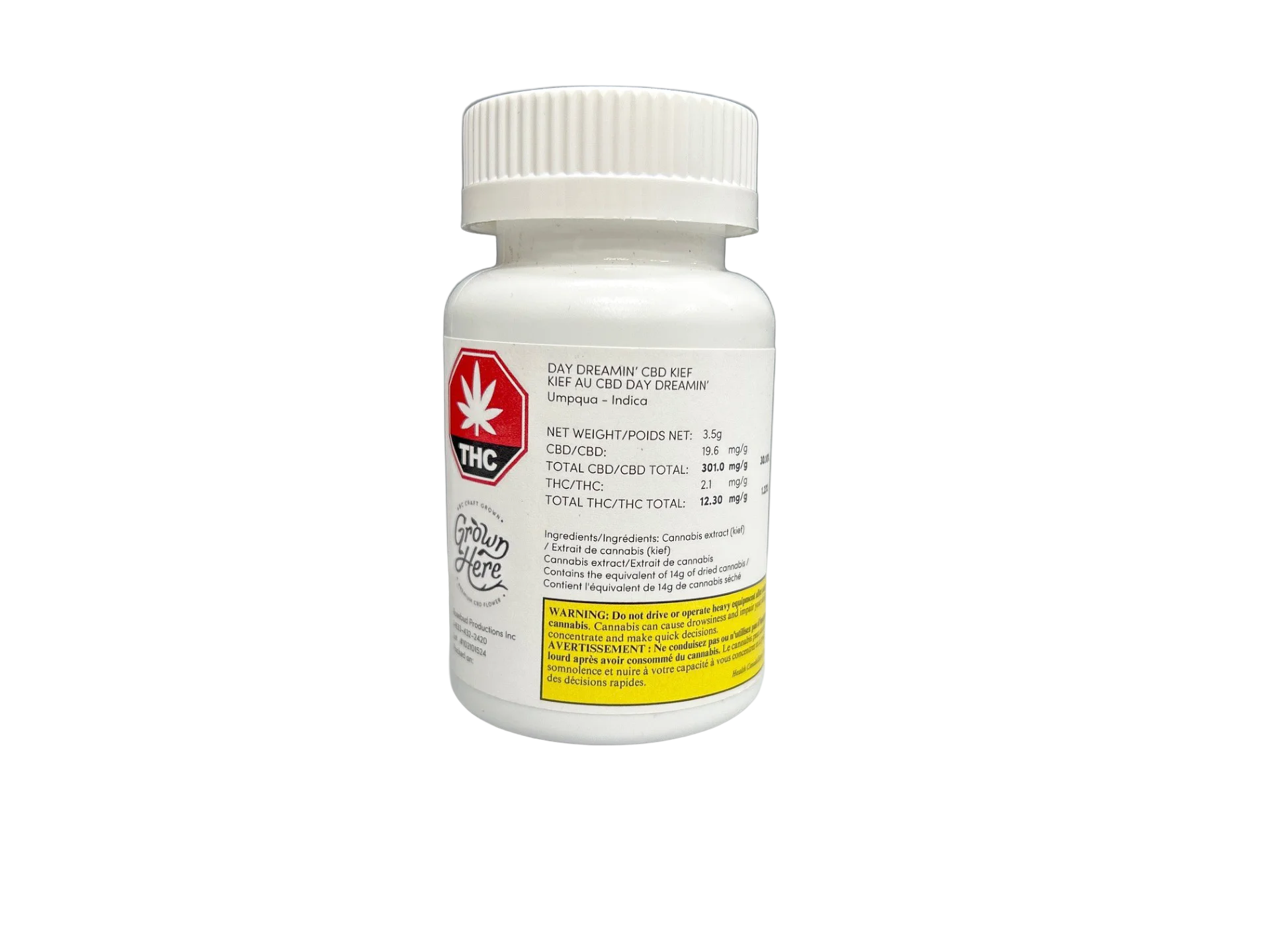 White bottle labeled Day Dreamin' CBD Kief by Grown Here, listing net weight, CBD and THC content, and warning text.