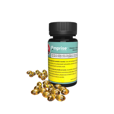 Black bottle of Emprise Dimension CBD softgels with teal label, shown beside a scattering of amber softgel capsules.