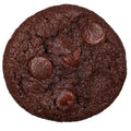 Single round double chocolate cookie studded with chocolate chips, viewed from above.