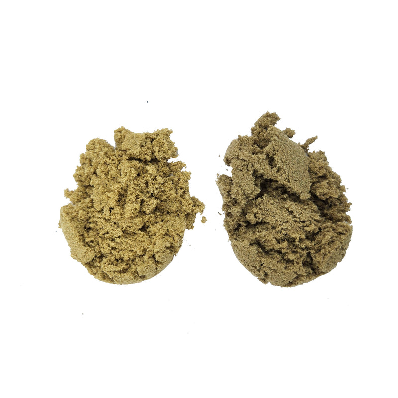 Two crumbly tan-green mounds of bubble hash side by side on a white background.