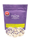 Purple Fauna Four Rivers Bath Bombs pouch with three round cream-coloured bath bombs speckled with dried purple flower petals in front.