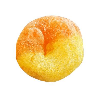 Single orange and yellow ring-shaped freeze-dried candy with a sugared, crumbly texture
