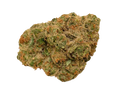 Close-up of a light green and orange cannabis flower bud coated in visible trichomes.