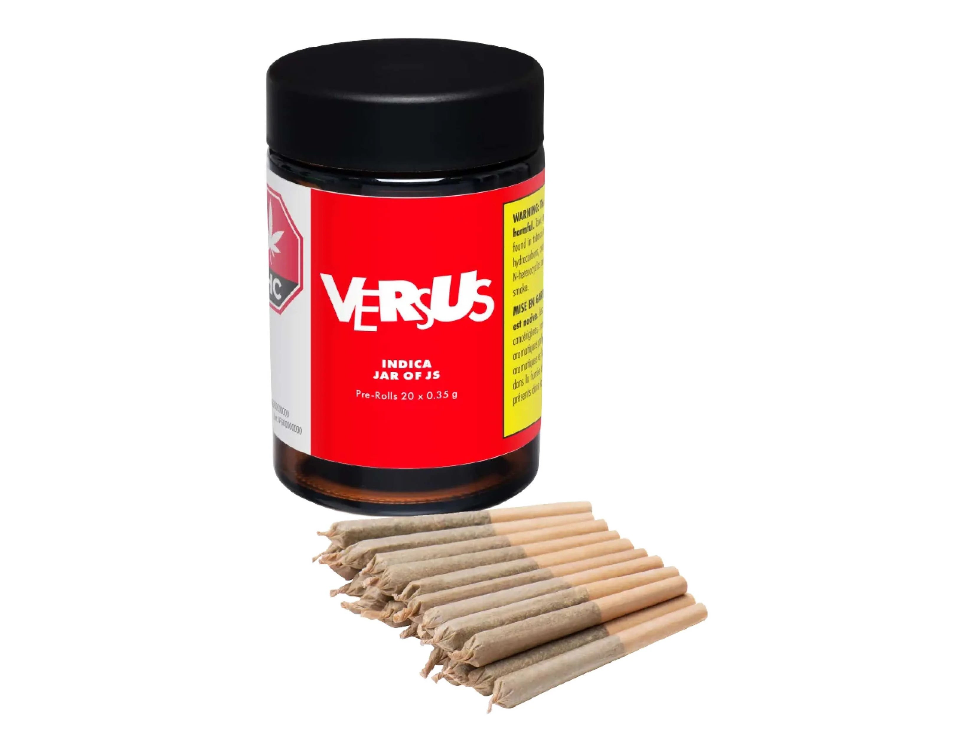 Black jar labeled Versus Indica Jar of Js Pre-Rolls 20 x 0.35 g, beside a row of pre-rolled joints with tan filter tips.