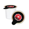 Two white single-serve coffee pods for Steeprock Instant Hash Coffee, each lid stamped with a red THC warning symbol.