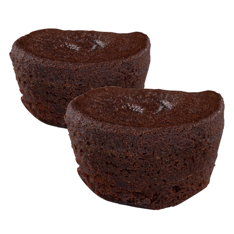 Two dark chocolate brownie bites with a dense, fudgy interior texture