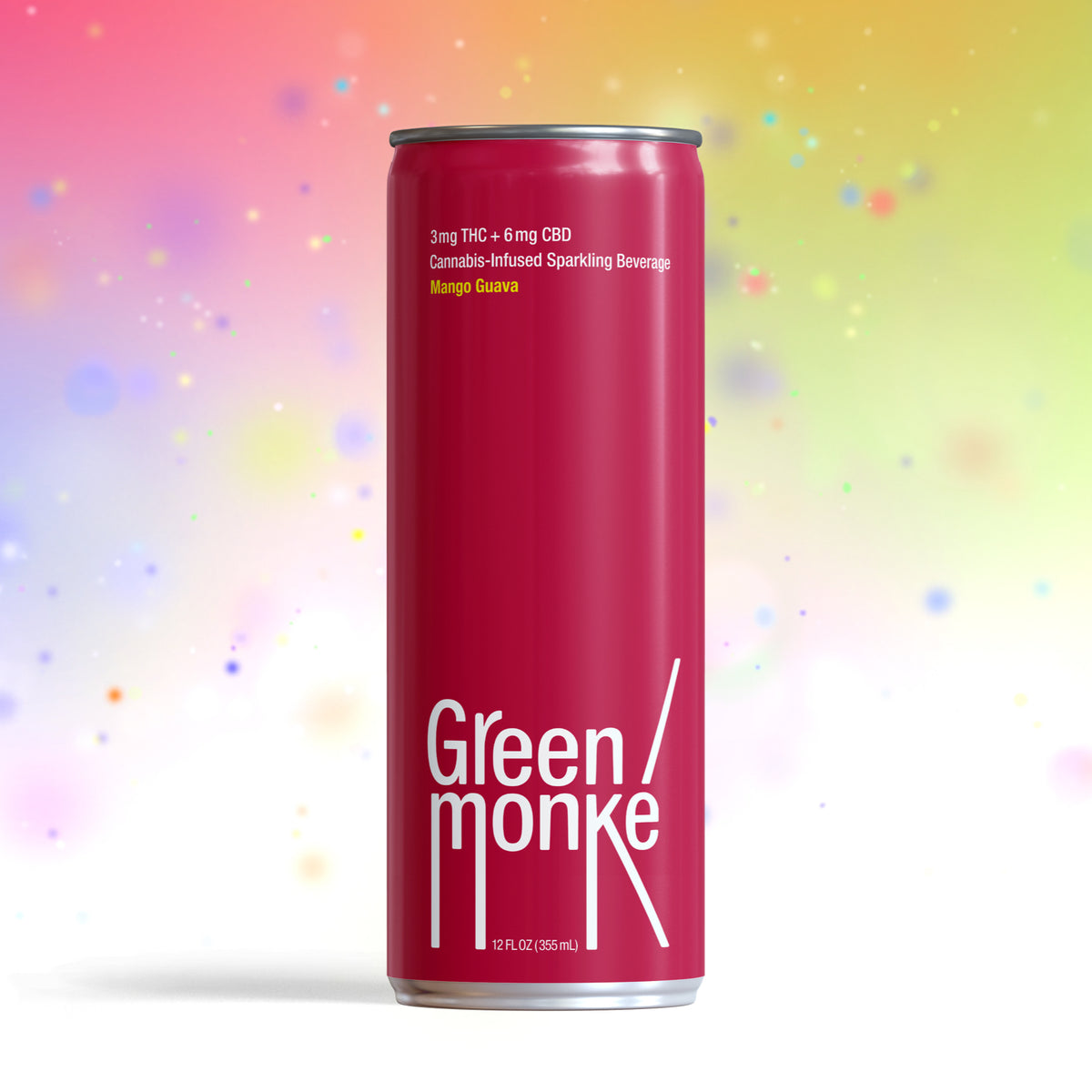 A magenta Green Monke beverage can labeled Mango Guava Cannabis-Infused Sparkling Beverage, 3mg THC + 6mg CBD, against a colorful blurred background.