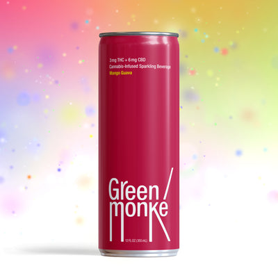 A magenta Green Monke beverage can labeled Mango Guava Cannabis-Infused Sparkling Beverage, 3mg THC + 6mg CBD, against a colorful blurred background.