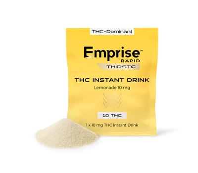 Yellow Emprise Rapid Thirstc THC Instant Drink pouch labeled Lemonade 10 mg, standing beside a mound of pale powdered drink mix.