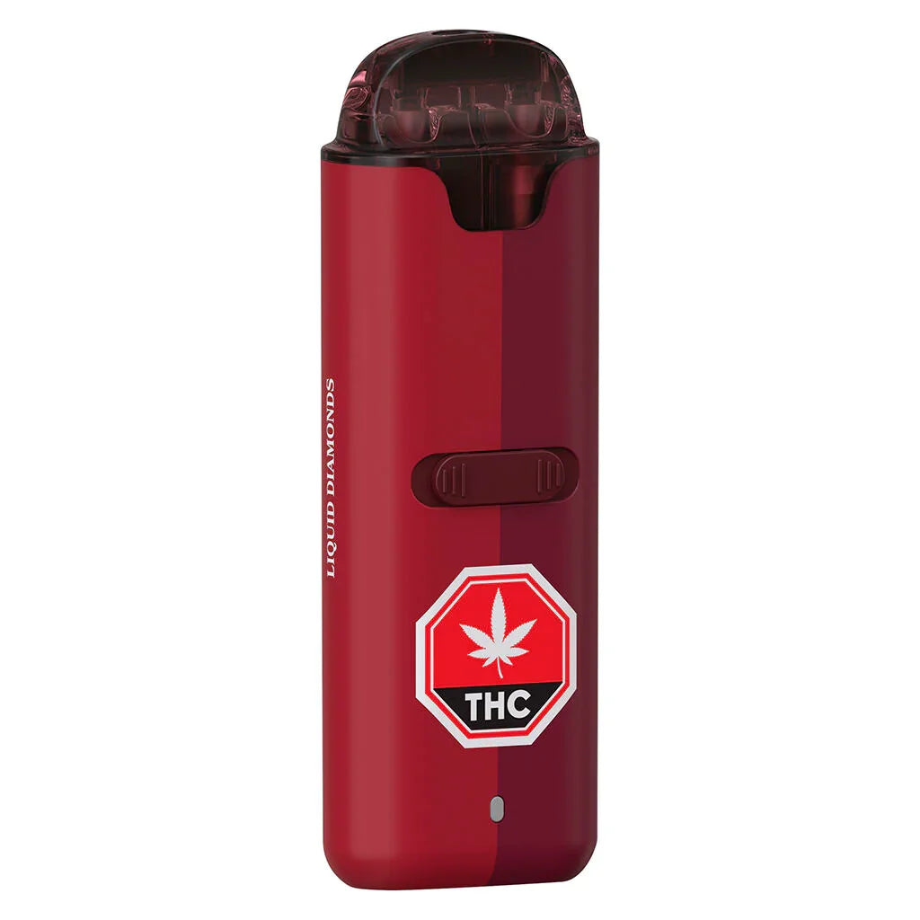 Red dual-chamber disposable vape device labeled Liquid Diamonds, with a THC warning icon on the front.