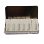 Open Medisenol case with mirrored lid, showing six foil-backed suppositories in individual blister pockets.