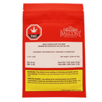 Red resealable Balcony Premium Edibles pouch for Milk Chocolate THC Bar, printed with dosage details and a THC warning symbol.