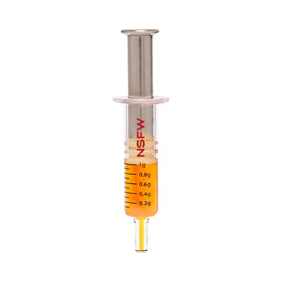 Glass dab applicator syringe filled with orange liquid diamond concentrate, labeled NSFW with volume markings from 0.2g to 1g.