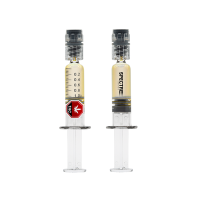 Two glass dab applicator syringes of amber Operation Orange Liquid Diamond Dabber concentrate, one marked with a 1.0 g dosage scale and THC symbol, branded Spectre Cannabis.
