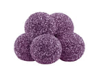 Five purple sugar-coated gummy pieces stacked together.