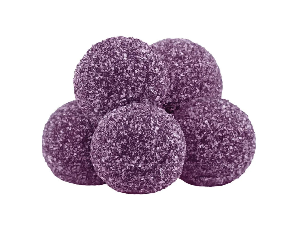 Five purple sugar-coated gummy pieces stacked together.
