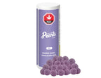 White tube of Pearls by Grön Marionberry Lemonade CBG with purple label, beside a pile of the sugar-coated gummies.