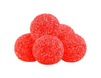 Five round, red sugar-coated Red Razzleberry gummy pearls piled together, shown without their container.