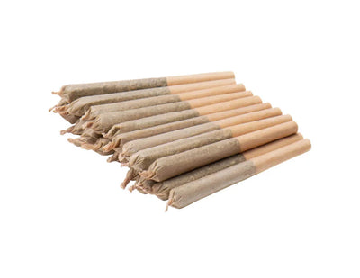 Twenty thin pre-rolled joints fanned out in an overlapping row.