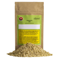 Kraft paper pouch of Rebound by Stewart Farms Seaweed OG CBD salt soak with a green label, next to a pile of tan bath salt granules.