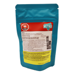 Back of the teal Retro Stardust pouch showing Blueberry Kush strain details, THC content, and Health Canada warning text