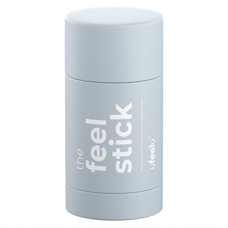 Light gray cylindrical stick container labeled "the feel stick" by ufeelu, standing upright on a white background.